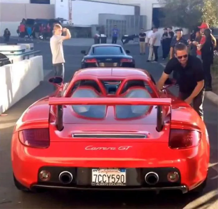 Paul Walker going into the car that crashed