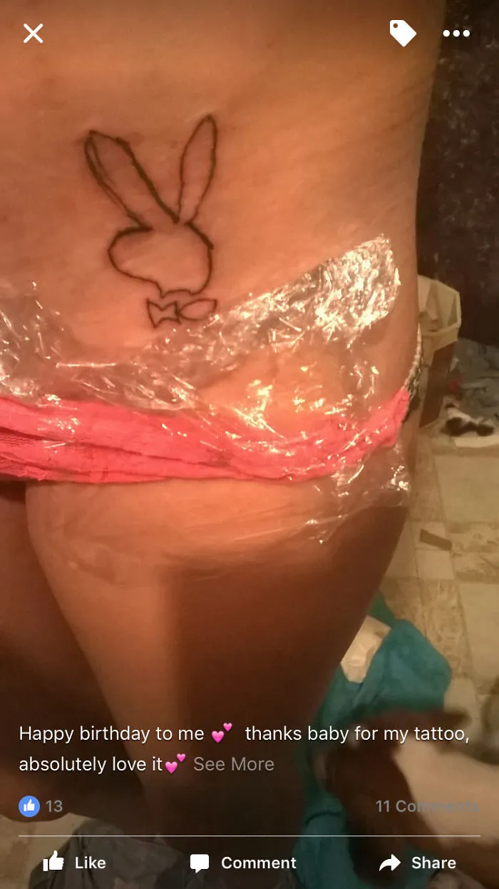 Funny tattoo fail with a distorted bunny outline on skin wrapped in plastic.
