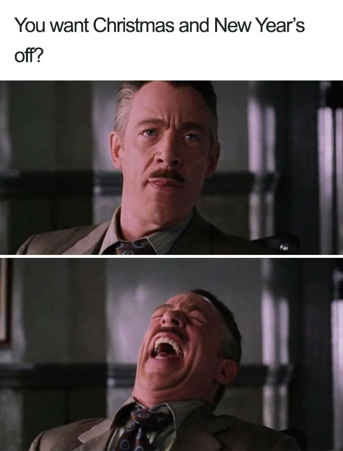 Man in a suit laughing at the idea of taking holidays off, capturing a hilarious restaurant meme moment.