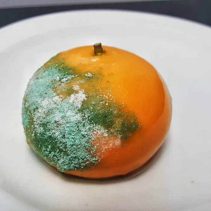 Parfait de naranja, polvo de merengue de chicle