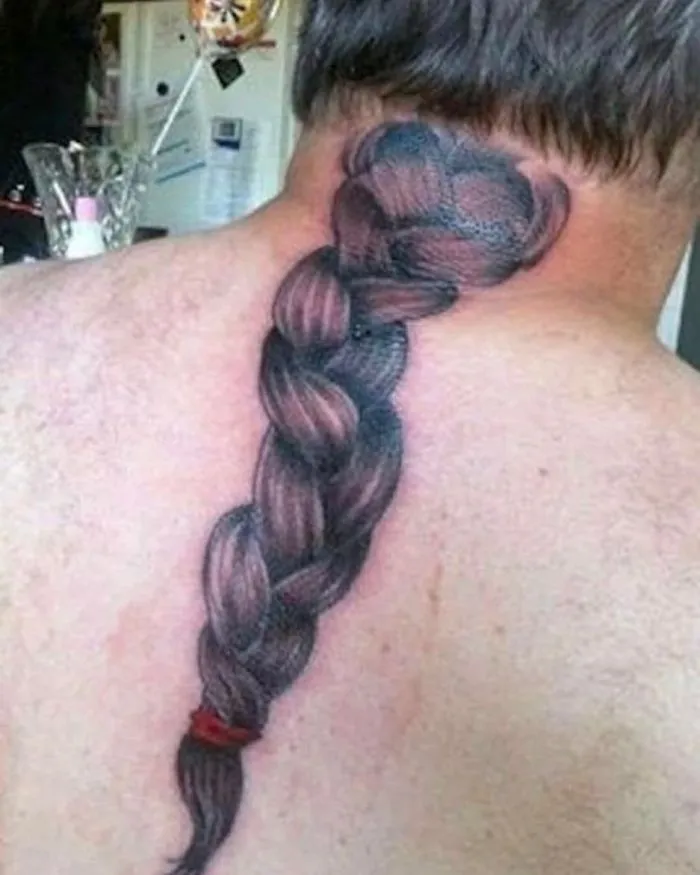 Tattoo fail of a braided hair design on a man's neck, attempting humorously realistic detail.