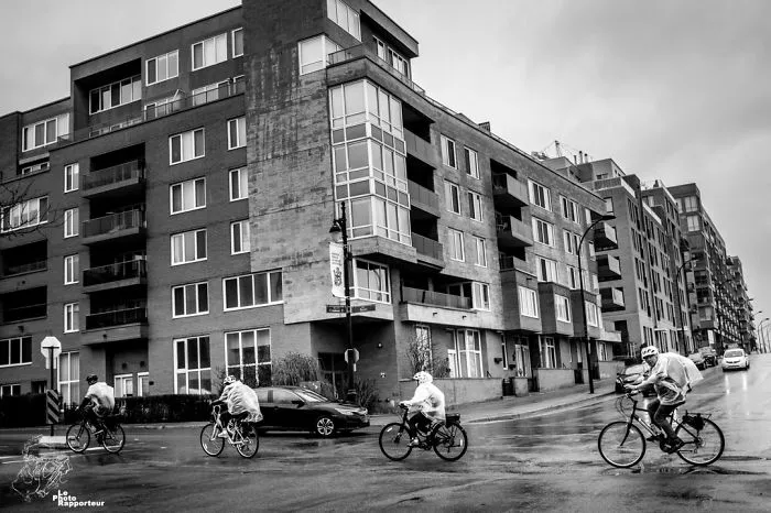 On Thursday, May 3rd 2018 At 2:45pm, Four Brave Cyclists Were Riding Through The Rain Wearing Plastic Ponchos