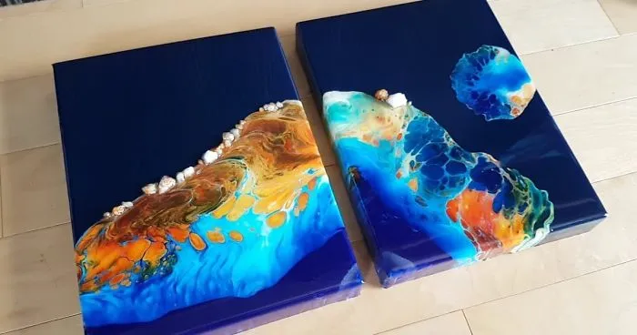 Fluid Paintings Created By Pouring Acrylic Paints On Resin