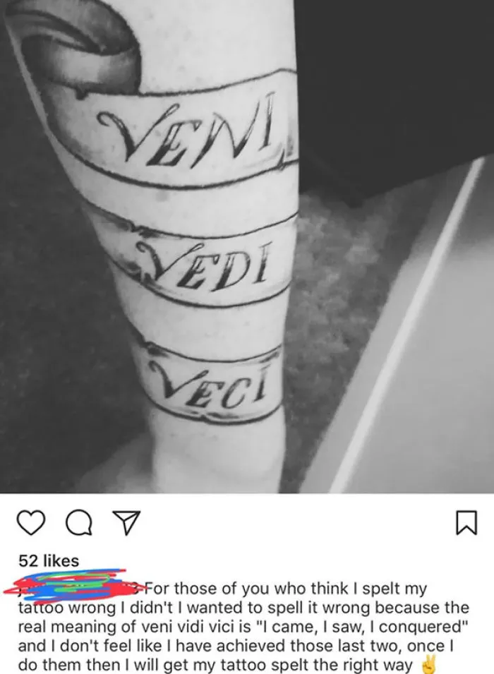 Misspelled "Veni Vidi Vici" tattoo on an arm, showcasing a tattoo fail.