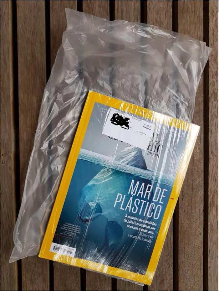 National Geographic Magazine That Warns About Danger Of Plastic Bags Comes Inside A Plastic Bag That Is Inside A Plastic Bag