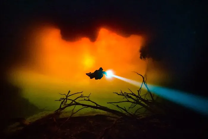 Wide Angle Category: "Tannic Water At Cenote Carwash" By Tom St George, Mexico