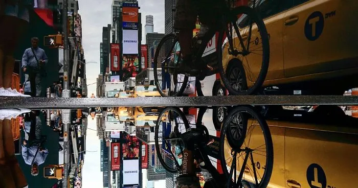 You´ve Never Seen Nyc Like This. I Caputred 
the Parallel Worlds Of New York City Through Puddles
