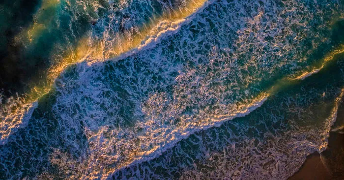 Drone Shots Of The Surfers On Llandudno Beach