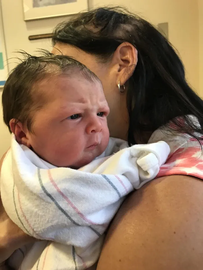 At 2 Days Old, My Daughter Has Perfected The “Are They Using My Driveway To Turn Around?” Look