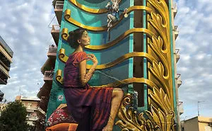 Artist Creates Large Scale Street Art Murals Across Europe, Makes Boring Buildings Interesting