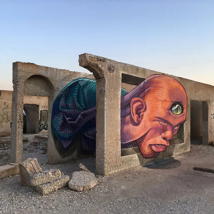 Artist Creates Large Scale Street Art Murals Across Europe, Makes Boring Buildings Interesting
