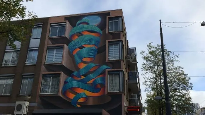Artist Creates Large Scale Street Art Murals Across Europe, Makes Boring Buildings Interesting
