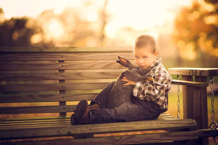 These Epic Photos Of Kids And Barnyard Animals Will Make You Wish You Grew Up On A Farm