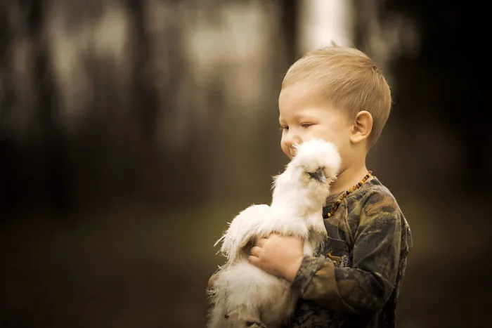 These Epic Photos Of Kids And Barnyard Animals Will Make You Wish You Grew Up On A Farm