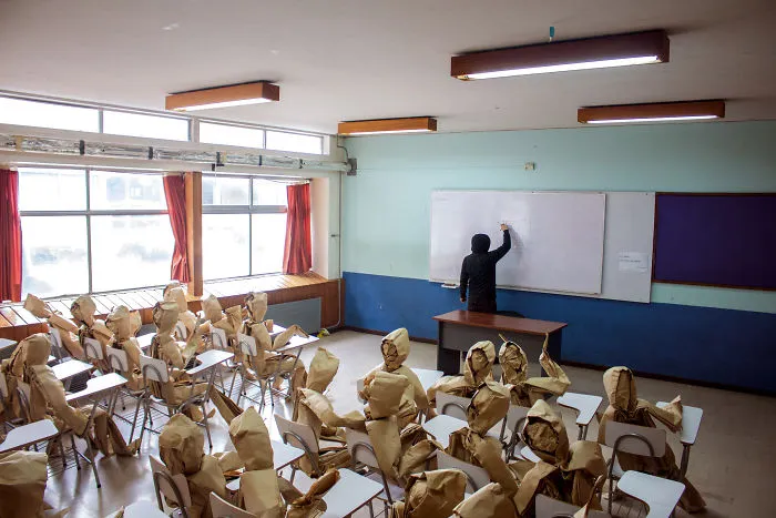 250 Life-Sized Paper People Invade The Streets To Reflect On Public Spaces In Chile