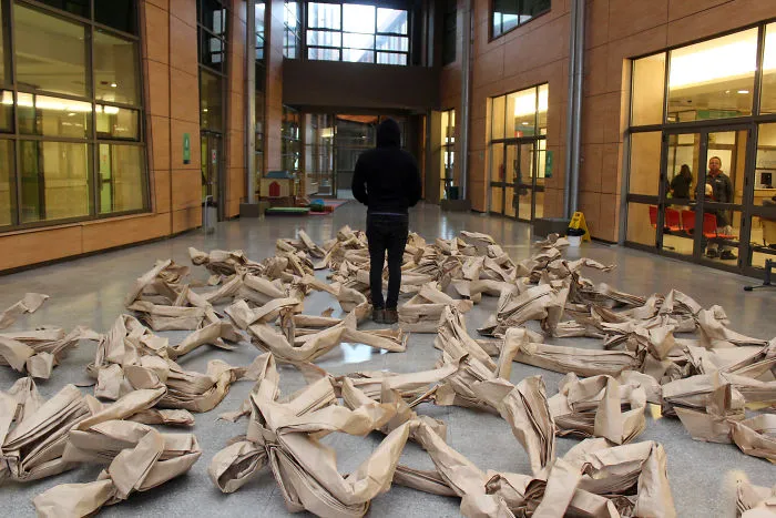 250 Life-Sized Paper People Invade The Streets To Reflect On Public Spaces In Chile