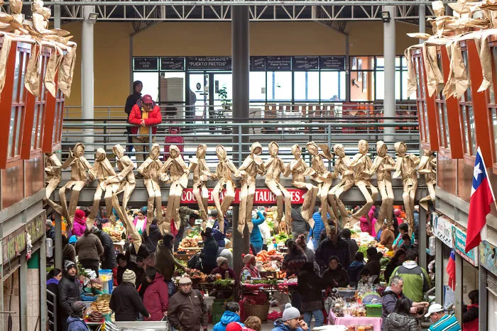 250 Life-Sized Paper People Invade The Streets To Reflect On Public Spaces In Chile