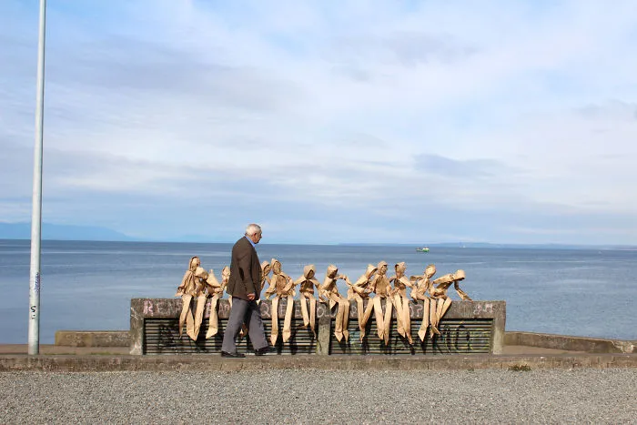 250 Life-Sized Paper People Invade The Streets To Reflect On Public Spaces In Chile
