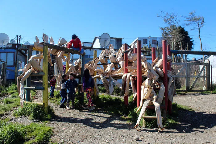 250 Life-Sized Paper People Invade The Streets To Reflect On Public Spaces In Chile