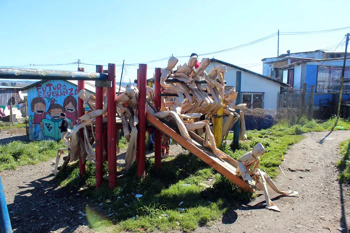 250 Life-Sized Paper People Invade The Streets To Reflect On Public Spaces In Chile