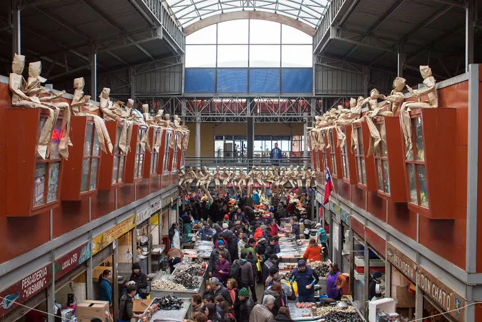 250 Life-Sized Paper People Invade The Streets To Reflect On Public Spaces In Chile