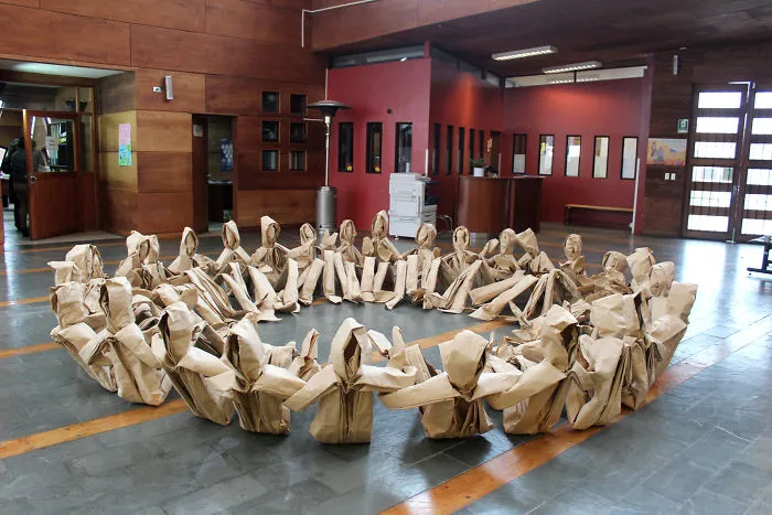 250 Life-Sized Paper People Invade The Streets To Reflect On Public Spaces In Chile