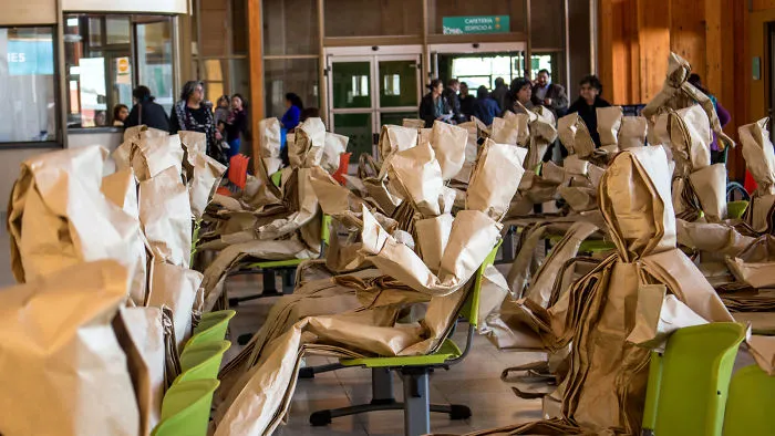 250 Life-Sized Paper People Invade The Streets To Reflect On Public Spaces In Chile