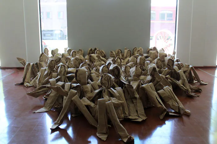 250 Life-Sized Paper People Invade The Streets To Reflect On Public Spaces In Chile