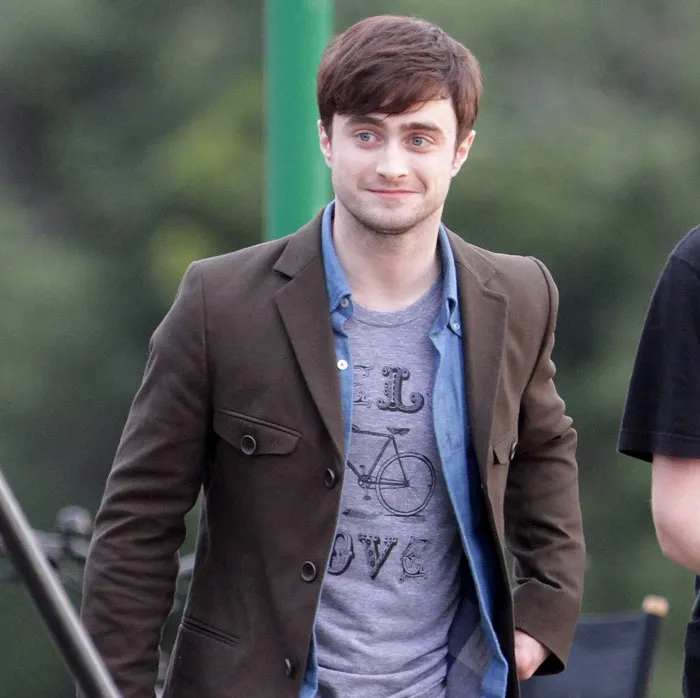 Daniel Radcliffe walking and smiling