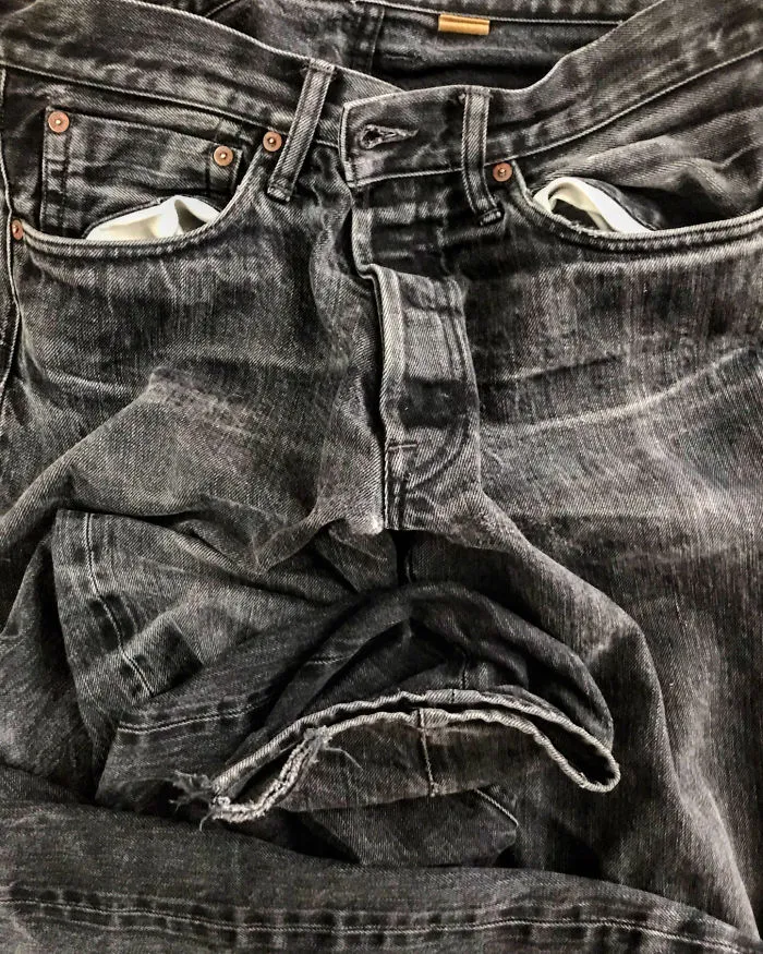 A Pair Of Black Jeans Feeling Blue.