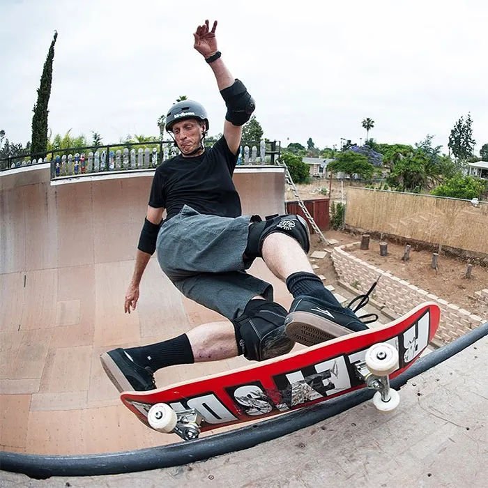 Tony Hawk performing tricks with his skateboard
