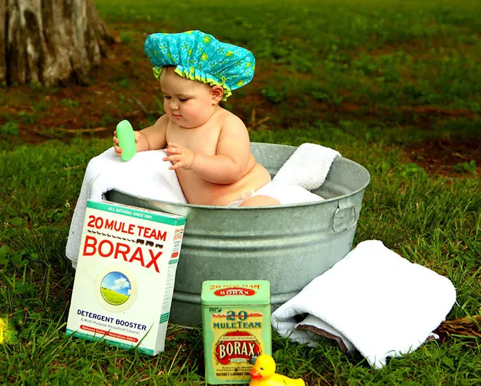Baby sitting in bath