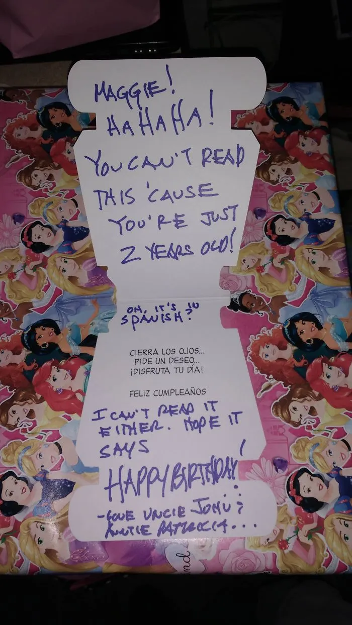 Funny dad joke on a gift card written for a two-year-old, with Disney princess wrapping paper.