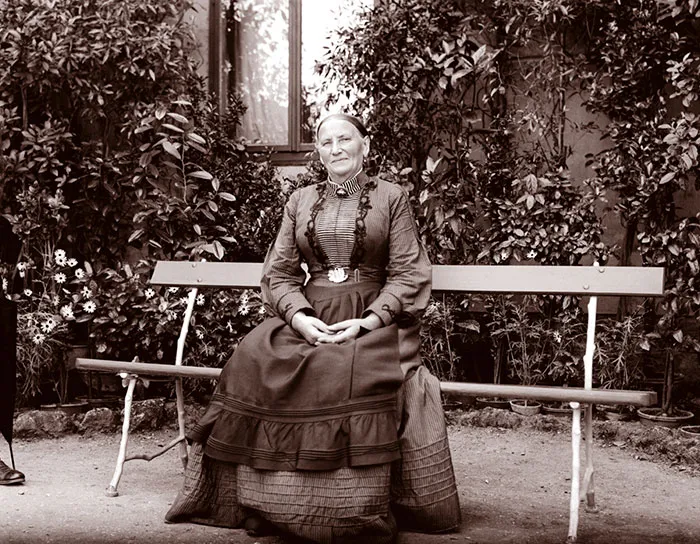 Mature Woman On Bench