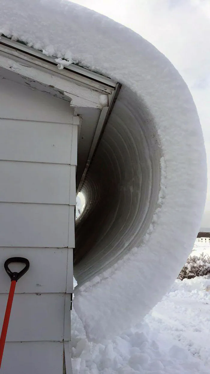 Snow Is Curling Off This Roof