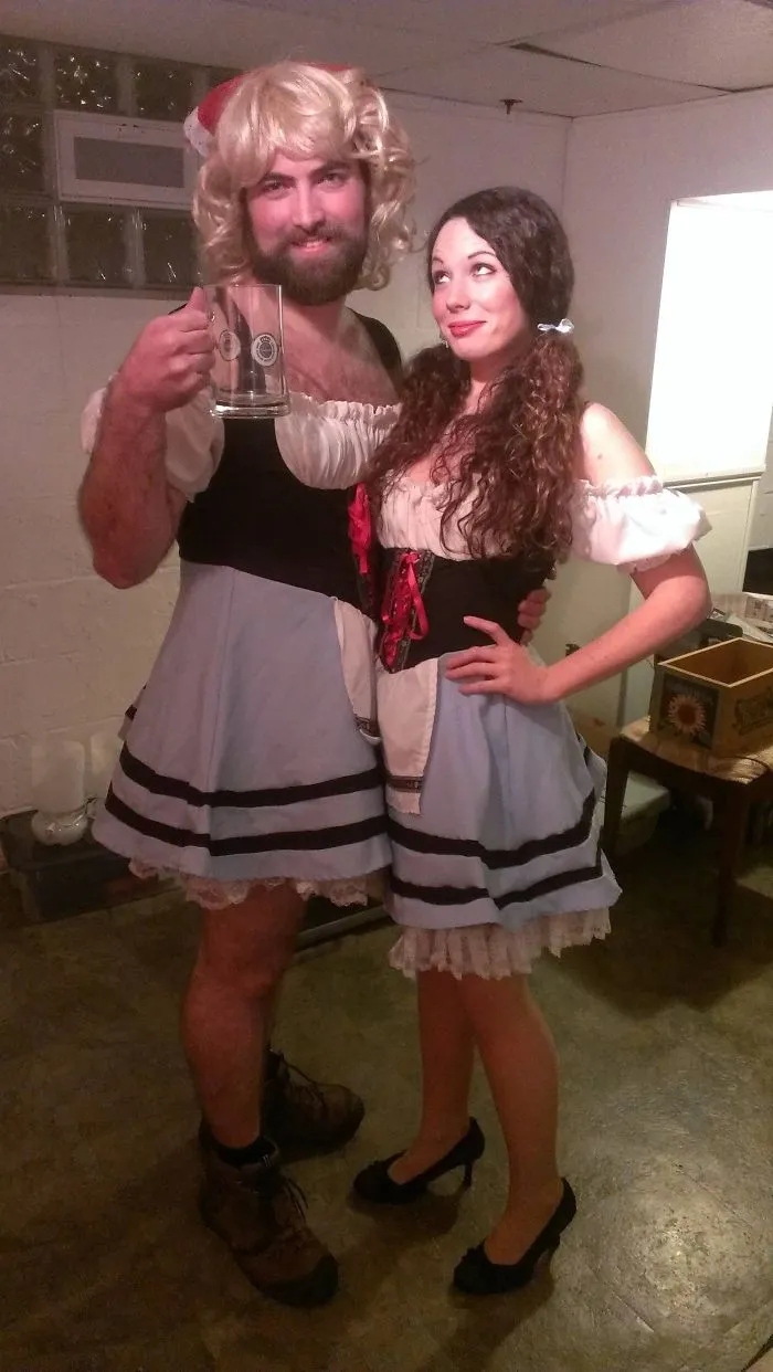 Creative couples Halloween costume ideas with a man and woman swapping traditional Oktoberfest outfits