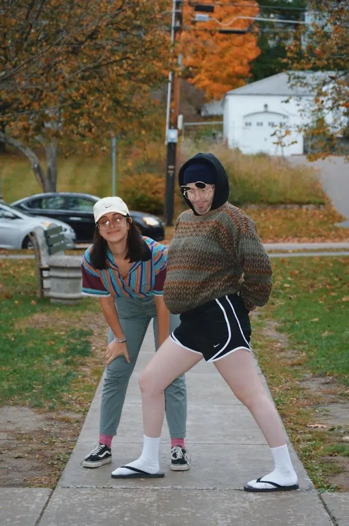Two people wearing quirky outfits outdoors, fun couples Halloween costume ideas.