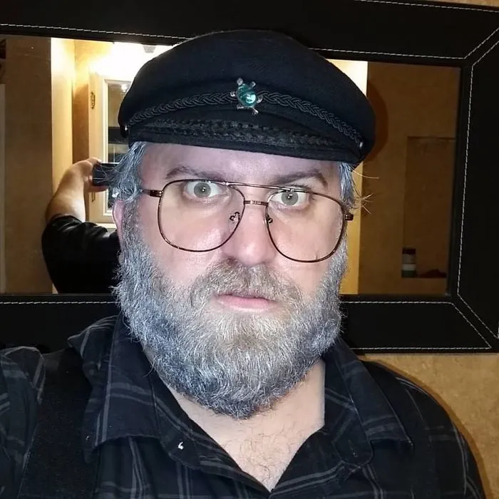Man dressed in a captain hat and glasses as a creative Halloween costume idea