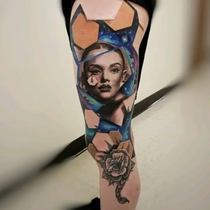 3D tattoo of a woman's face with geometric shapes on a leg, creating a stunning optical illusion.