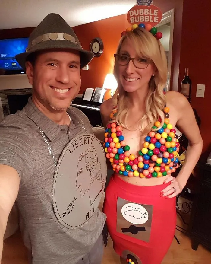 A couple dressed up as a quarter and a gumball machine for a creative couples Halloween costume idea.