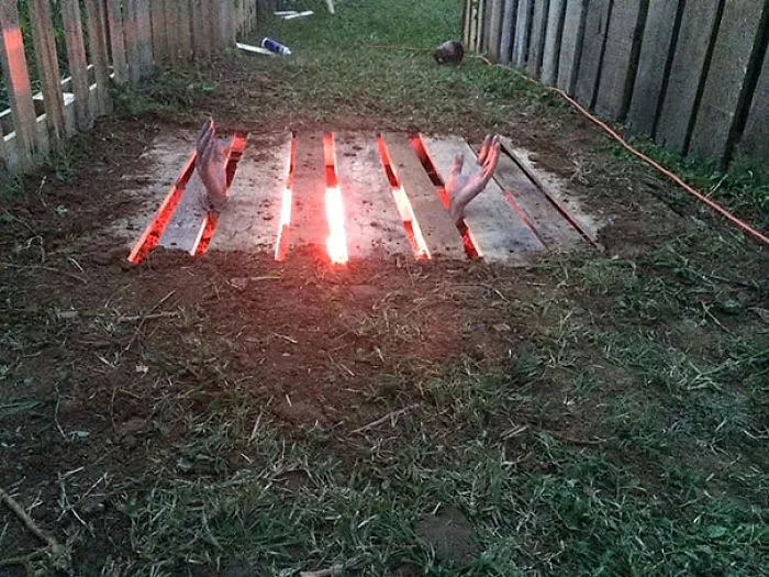 Just A Pallet, Red Light, And Fake Hands