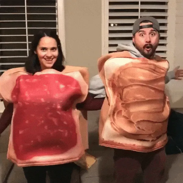 Couples in creative peanut butter and jelly costumes, showcasing a unique Halloween outfit idea.