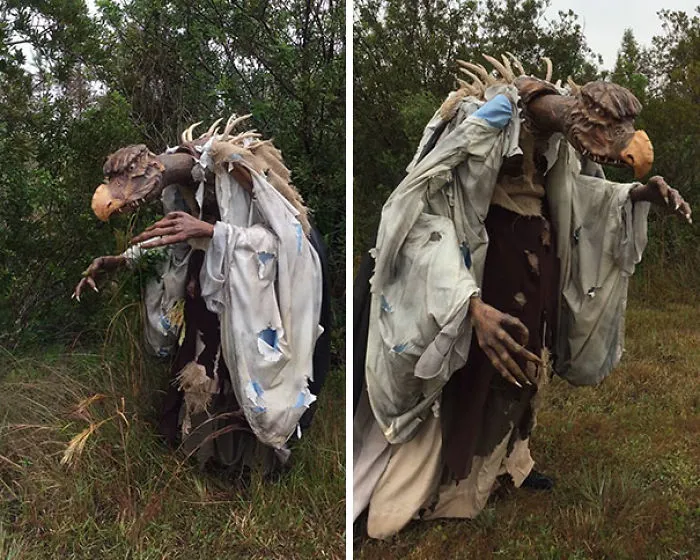 A person in a realistic Skeksis creature suit, showing off unique Halloween costume ideas in a field.