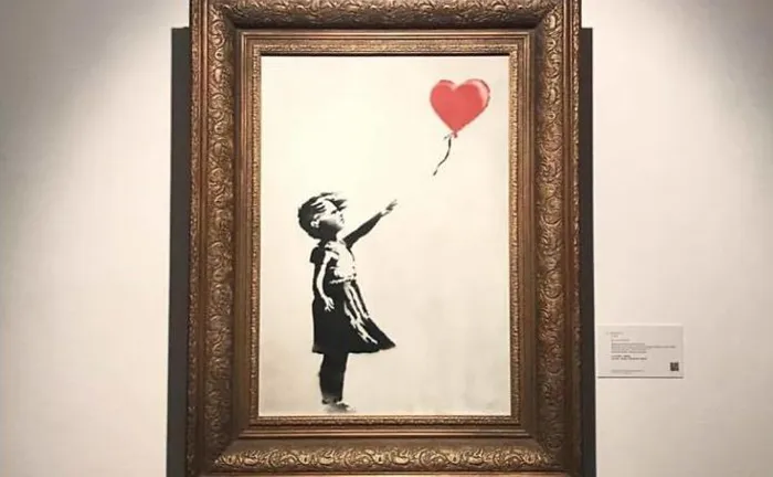 Banksy Artwork Shredded Itself Seconds After Being Sold For More Than 1 Million Dollars