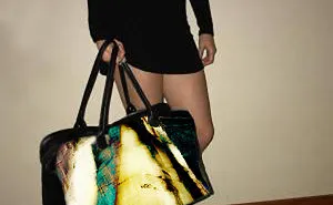 Images On Leather Bags By An Internationally Recognized Photographer
