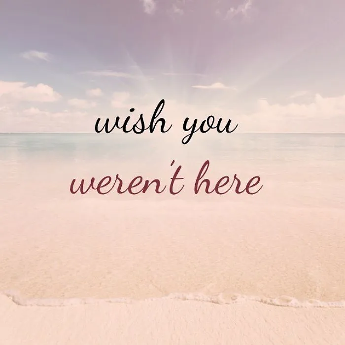 Pessimistic Instagram quote saying wish you werent here over a calm beach background at sunset.