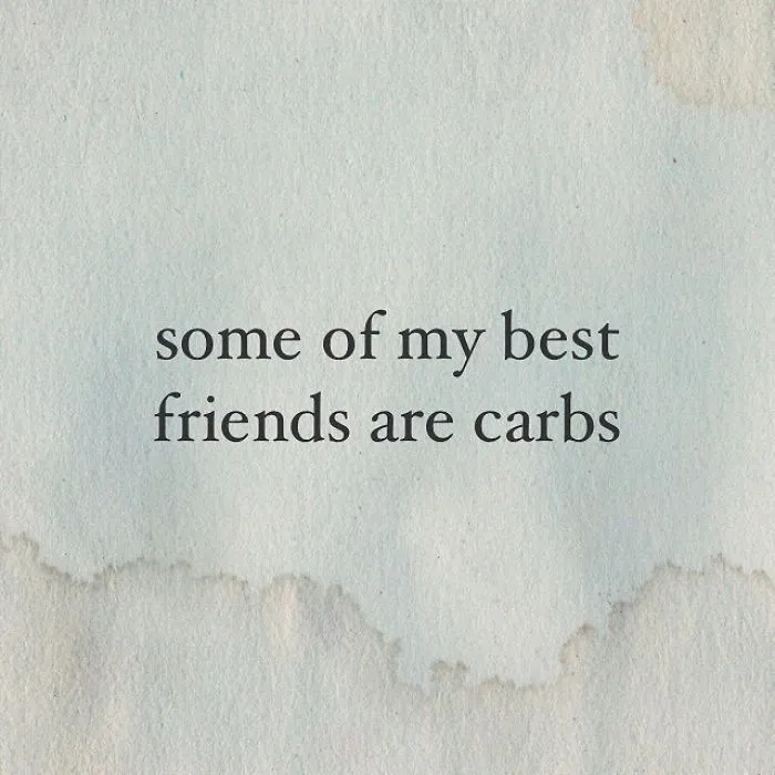Text quote on a stained paper background highlighting hilariously unispirational quotes about carbs as best friends.