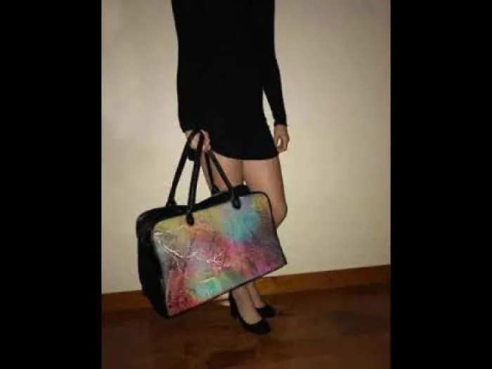 Images On Leather Bags By An Internationally Recognized Photographer