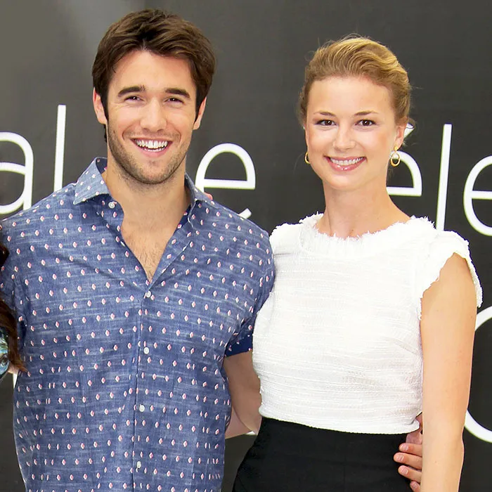 Smiling actors posing together at an event, showcasing celebrities who fell in love while acting on set.