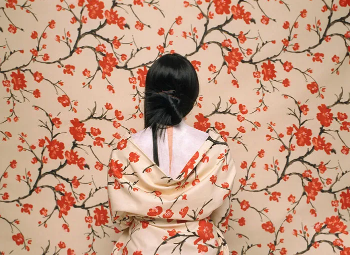 Artist Paints Her Body And Makes It Disappear Into Floral Backgrounds